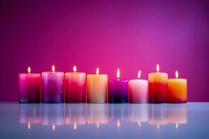 Artful arrangement of New Year celebration candles isolated on a gradient background photo