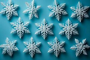 Detailed shot of DIY snowflakes on New Year isolated on a gradient background photo