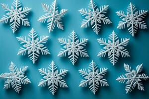 Detailed shot of DIY snowflakes on New Year isolated on a gradient background photo