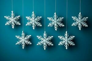 Detailed shot of DIY snowflakes on New Year isolated on a gradient background photo