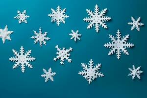 Detailed shot of DIY snowflakes on New Year isolated on a gradient background photo