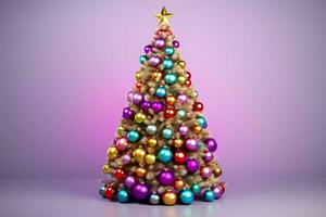 Christmas tree adorned with festive ornaments and lights isolated on a gradient background photo