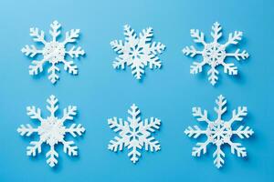 Detailed shot of DIY snowflakes on New Year isolated on a gradient background photo