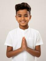 Happy Indian kid in casual clothing against a neutral background AI Generative photo