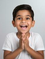 Happy Indian kid in casual clothing against a neutral background AI Generative photo