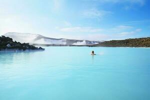 A blissful swim in a pristine blue lagoon photo