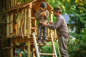 A father and son building a treehouse together photo