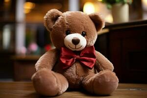 A plush teddy bear with a bow tie photo