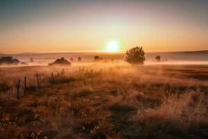 A sunrise over a foggy plain photo