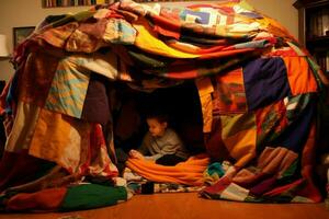 Building a fort with blankets and pillows photo
