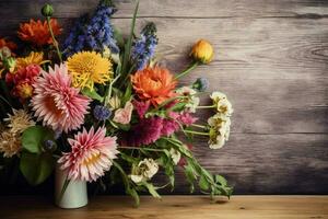 a bunch of flowers on a wooden background photo