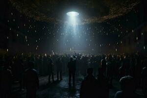 a crowd of people stand in a dark room with lights photo