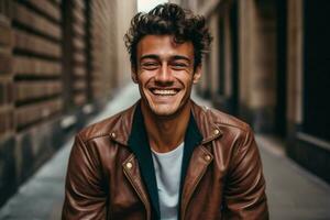 a man wearing a brown leather jacket smiles for t photo