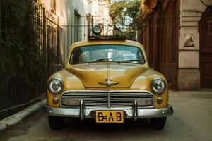a vintage car with a yellow license plate that says photo