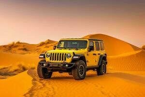 a yellow 2020 jeep suv is driving through the des photo