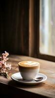 A serene composition of a cappuccino coffee cup resting on a rustic wooden tabletop, with a softly textured background. Vertical format. AI generated photo