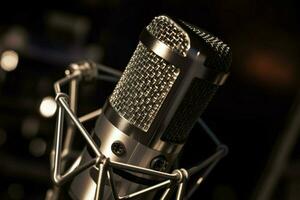 close up of a chrome condenser microphone on stage photo