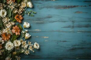 flowers on a blue wooden background photo