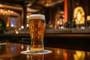 glass of beer on the bar in front of the bar photo