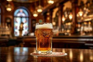 glass of beer on the bar in front of the bar photo