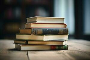 stack of textbooks on wooden table signifies educat photo