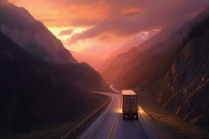 truck driving through mountain pass at sunset photo