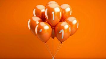 a bunch of orange balloons with the number 1 on photo