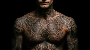 a man with a tattoo on his chest photo