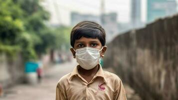 an indian boy wearing protective mask covid 19 ma photo