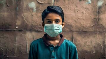 an indian boy wearing protective mask covid 19 ma photo