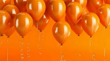 orange balloons on a bright orange background photo