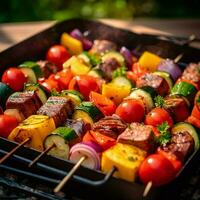 Tender cubes of beef skewered with colorful vegetable photo