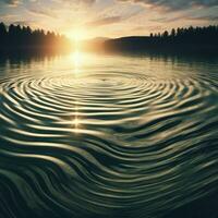 Slow ripples forming on a glassy lake photo