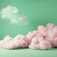 A cotton candy green background with fluffy clouds photo