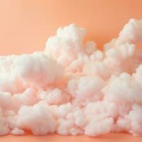 A cotton candy orange background with fluffy clouds photo