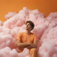 A cotton candy orange background with fluffy clouds photo