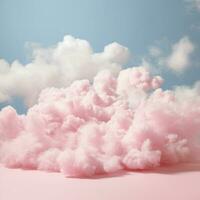 A cotton candy pink background with fluffy clouds photo