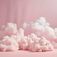 A cotton candy pink background with fluffy clouds photo