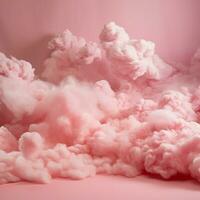 A cotton candy red background with fluffy clouds photo