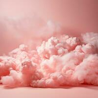 A cotton candy red background with fluffy clouds photo