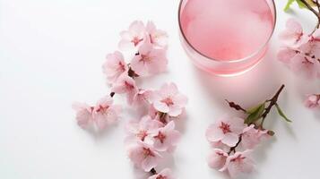 Photo of a Cherry Blossom Tea drink isolated on white background. Generative AI