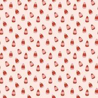 Candy corn seamless pattern. Trendy pink and red colors. Retro cartoon style. vector