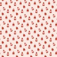 Candy corn seamless pattern. Trendy pink and red colors. Retro cartoon style. vector