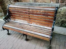 wood bench in street. vintage furniture photo