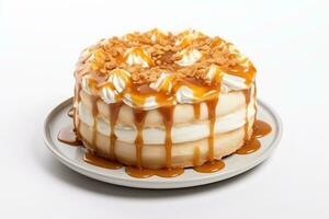 Creamy caramel cake with whipped cream and caramel on white background photo