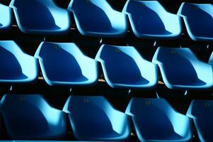 a row of blue chairs photo