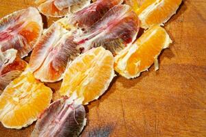 a table with a bunch of oranges on it photo