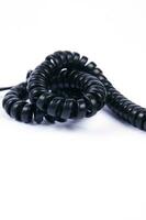 a black cord with a white background photo
