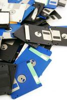 a pile of floppy disks photo