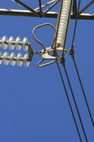 a close up of a power line with wires attached photo